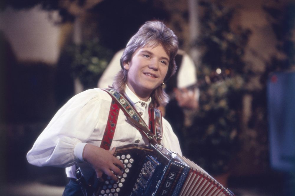 Florian „Quetschi“ Silbereisen mit seiner Harmonika in den 1990ern. 