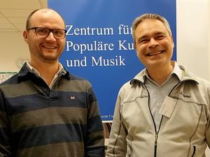  Rechts: Dr. Dr. Michael Fischer, geschäftsführender Direktor des Zentrums für populäre Kultur und Musik an der Universität Freiburg; Links: Dr. Johannes Müske