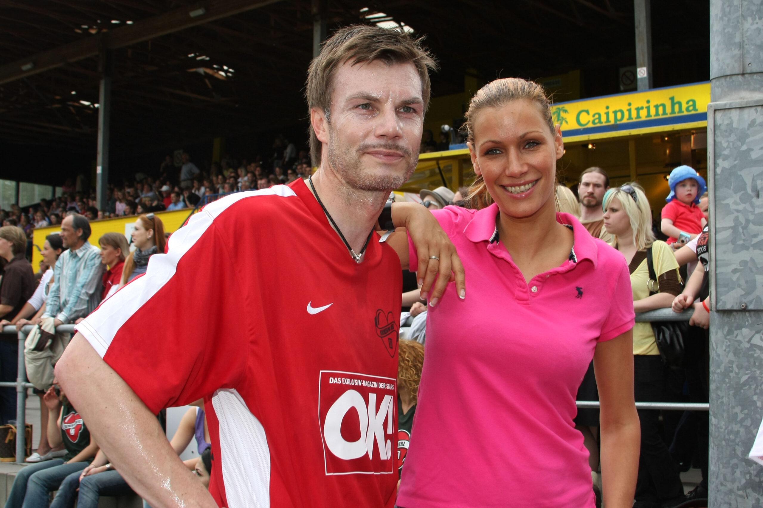 Thomas Helmer mit Yasmina Filali bei einem Benefizspiel 2009