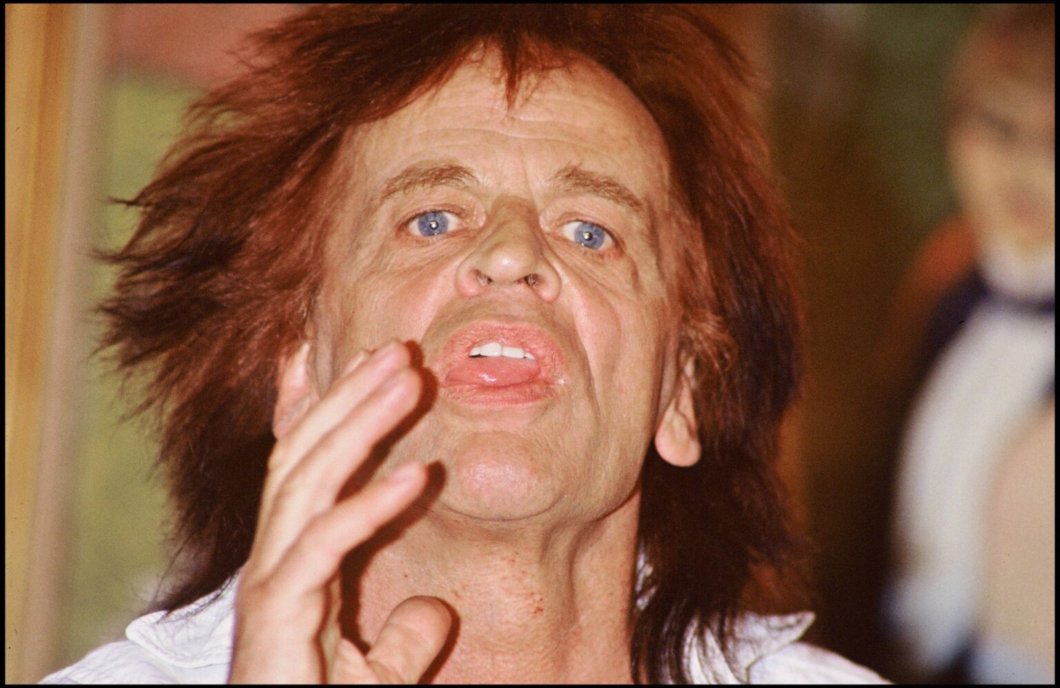 Klaus Kinski mit wilder Mähne beim Filmfestival in Cannes 1988